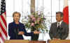 Clinton meets with the Japanese Foreign Minister (photo), and Japan's Prime Minister Taro Aso in Tokyo.