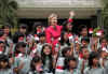 Secretary of State Hillary Clinton arrives in Jakarta, Indonesia and is greeted by elementary students from President Barack Obama's former Indonesian school when he lived in Jakarta with his mother in the early 1970s.