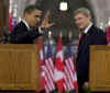 President Barack Obama says goodbye after a joint news conference on Parliament Hill with Canadian PM Stephen Harper.
