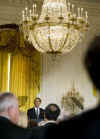 President Obama arrives to speak to America's city mayors at the Conference of Mayors held in the East Room of the White House. President Obama discussed the responsibility of mayors to ensure stimulus money is spent without corruption.