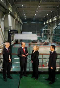 Secretary of State Hillary Clinton tours a Geothermal power plant in Beijing with senior GE Chine officials, and meets with plant employees. 