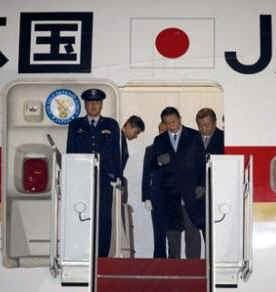 Japan's PM Taro Aso arrives at Andrews Air Force Base on February 23, 2009.