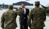 President Obama and Secretary of Defense Gates travel to Camp Lejeune, North Carolina via Marine One and Air Force One.