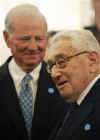 Hillary Clinton is officially sworn in as US Secretary of State by Vice President Joe Biden at the State Department in Washington on February 2, 2009. Guests for the ceremony included former Secretaries of State James Baker and Henry Kissinger (photo). and celebrities like Chevy Chase. Daughter Chelsea and husband Bill Clinton joined the ceremony, with former President Bill Clinton holding the Bible for the swear-in.