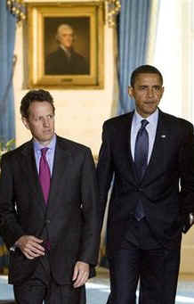 President Barack Obama leaves the Blue Room of the White House and speaks in the Grand Foyer with Treasury Secretary Timothy Geithner. Obama advises that any financial institution that requires a bailout will cap executive salaries at $500,000 per year.