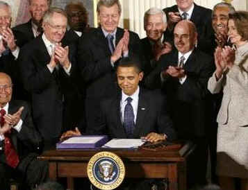 President Barack Obama signs the $32.8 billion State Children's Health Insurance Program in the East Room of the White House on February 4, 2009..