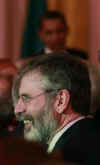 President Barack Obama, First Lady Michelle Obama, and Vice President Joe Biden join Irish Prime Minister Brian Cowen and leaders from Northern Ireland for a St. Patrick's Day reception in the East Room of the White House on March 17, 2009. Sinn Fein leader Gerry Adams (photo) also attended the White House reception.