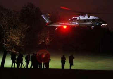 The Obama group arrives on Marine One at Winfield House the residence of the US Ambassador to the UK.