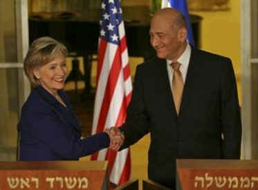 Secretary of State Hillary Clinton meets with Israeli PM Ehud Olmert in Jerusalem on March 3, 2009.