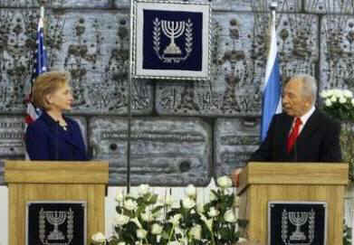 Secretary of State Hillary Clinton meets with Israeli President Shimo Peres in Jerusalem on March 3, 2009.