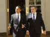 President Obama and PM Gordon Brown walk down the Colonnade to have a working lunch in the Old Family Dining Room.