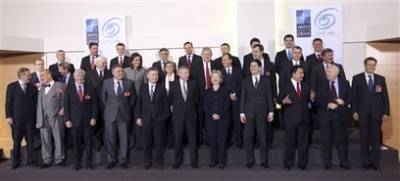 Secretary of State Hillary Clinton in Brussels for round table meetings with NATO foreign ministers (group photo).