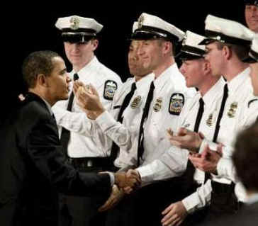 President Barack Obama speaks to the 114th Recruit Class of the Columbus Police Department at the Aladdin Shrine Center in Columbus, Ohio on March 6, 2009. The recruits are an early result of Obama's economic and employment stimulus initiatives.