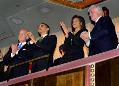President Barack Obama, First Lady Michelle Obama, and Vice President Joe Biden attend the Celebration Concert for Senator Edward Kennedy's 77th Birthday at the Kennedy Center in Washington, DC on March 8, 2009.