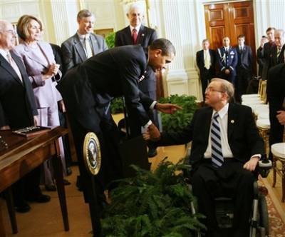 Obama shakes hands with representative Jim Langevin. President Barack Obama reverses the Bush administration policies on stem cell research and signs an Executive Order providing wider scientific use and federal funding of embryonic stem cell research opening a new scientific front free of political ideology.