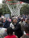 President Barack Obama took some time away from the traditional White House Easter Egg Roll to throw a few basketball hoops with the Easter Monday crowd on the White House grounds on April 13, 2009. 
