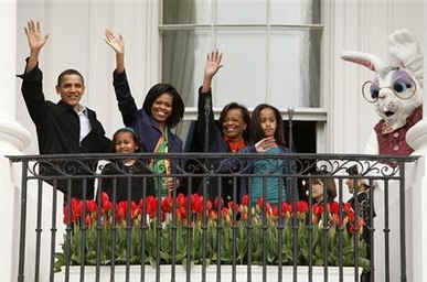 President Barack Obama and First Lady Michelle Obama speak to a crowd of about 3,000 from the Truman Balcony at the White House.