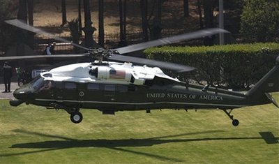 President Obama is transported to Campo de Mart Military Field via Marine One to join Mexican President Calderon.
