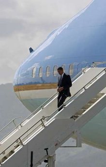President Obama delays Canadian PM Stephen Harper after arriving on Air Force One in Port of Spain, Trinidad and Tobago on April 18, 2009.