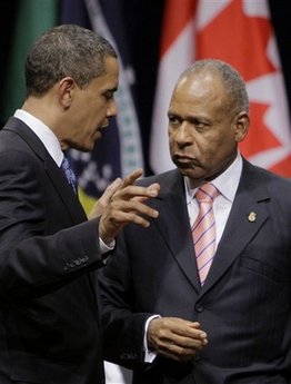 President Obama talks to the Prime Minister of Trinidad and Tobago Patrick Manning