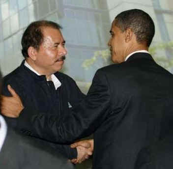 President Barack Obama greets Nicaragua's President Ortega and other summit leaders prior to the official photo of the Heads of State.