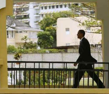 President Obama on his way to a news conference on the rooftop of his hotel in Port of Spain, Trinidad and Tobago on April 19, 2009.