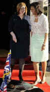 First Lady Michelle Obama and Sarah Brown leave 10 Downing Street to visit a cancer center in West London.