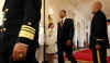 President Barack Obama on his way to the East Room of the White House.