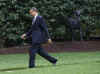 President Barack Obama leaves the Oval Office and walks across the South Lawn of the White House.