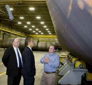 President Barack Obama tours the Trinity Structural Towers Manufacturing Plant in Newton, Iowa on Earth Day, April 22, 2009.