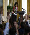First Lady Michelle Obama speaks to the children of White House staffers at the Take Your Kids To Work Day in the East Room of the White House on April 23, 2009.