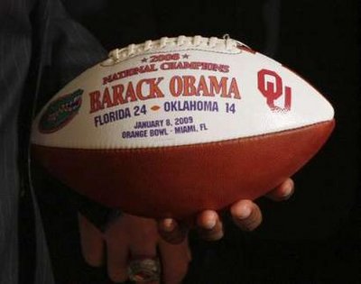 The Gators football team presented President Obama with a Championship football and a personalized team jersey.