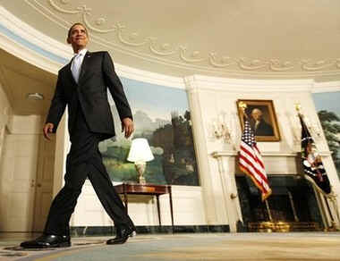 President Barack Obama leaves after speaking on higher education in the Diplomatic Reception Room of the White House on April 24, 2009.