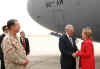 Secretary Clinton is met by US Ambassador to Iraq Christopher Hill.