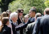 President Barack Obama greets guests after a ceremony honoring the NCAA Division 1 Basketball Champions from the University of Connecticut in front of the South Portico of the White House on April 27, 2009.