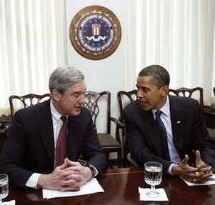 President Barack Obama meets with FBI Director Robert Mueller at FBI Headquarters in Washington on April 28, 2009.
