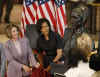 First Lady Michelle Obama, Secretary of State Hillary Clinton, Speaker of the House Nancy Pelosi and other guests join in an unveiling ceremony of the sculpted bust of Sojourner Truth.