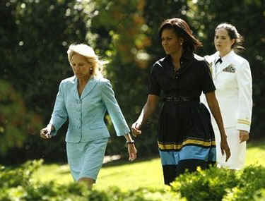First Lady Michelle Obama and Second Lady Jill Biden arrive at the award ceremony.