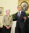 President Barack Obama joins the swearing in ceremony of Kathleen Sebelius as the new Secretary of Health and Human Services in the Oval Office of the White House on April 28, 2009. 