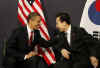 President Barack Obama meets with South Korean President Lee Myung-bak at the Excel Centre in London 