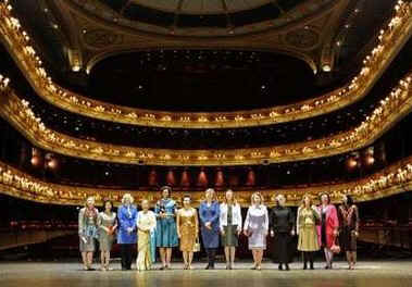 First Lady Michelle Obama joins Sarah Brown, the wife of UK PM Brown, and other spouses of G20 leaders at a special performance of Giselle at the Royal Opera House in London on April 2, 2009.
