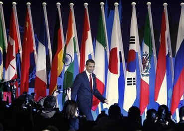 President Barack Obama arrives for a G20 press conference on the main stage of the Excel Centre in London, UK.