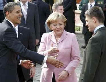 President Barack Obama and First Lady Michelle Obama are cheered by the crowd, and welcomed by German Chancellor Angela Merkel and her husband Joachim Sauer (photo) in the market at Baden-Baden, Germany on April 3, 2009.