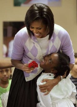 First Lady Michelle Obama celebrates Cinco de Mayo, an Hispanic heritage event, in a celebration with students at Lamb Public Charter School in Washington on May 4, 2009.