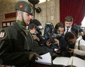 Photographers after President Barack Obama signs the Memorial Book in the Anitkabir Mausoleum in Ankara, Turkey on April 6, 2009.