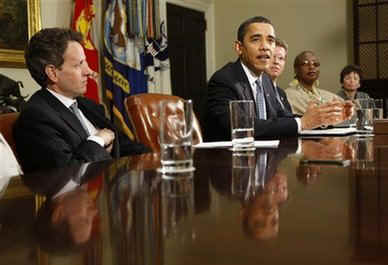 President Barack Obama meets in the Roosevelt Room of the White House with Treasury Secretary Tim Geithner and Housing and Urban Development Secretary Shaun Donovan to discuss the housing industry and the impact of low interest rates.