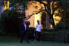 President Barack Obama and First Lady Michelle Obama return to the White House and walk across the South Lawn after a Saturday evening dinner.