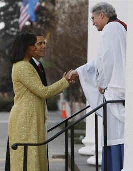 Michelle and Barack Obama meet with Reverend Luis Leon at St. John's Church across from the White House.