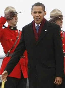 President Barack Obama is greeted at the airport by Canadian Governor General Michaelle Jean at Ottawa airport.