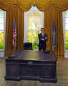 The press is invited to the unveiling of a Barack Obama wax replica in a mock-up of the Oval Office in the White House.